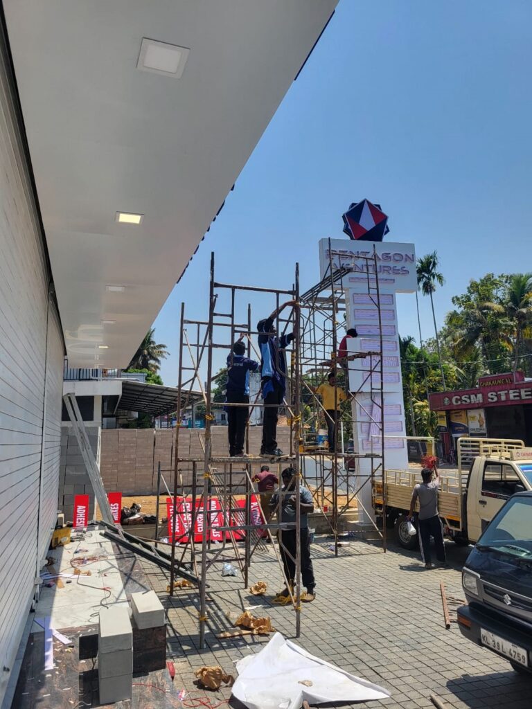 Hygienics team on scaffolding cleaning a commercial building facade